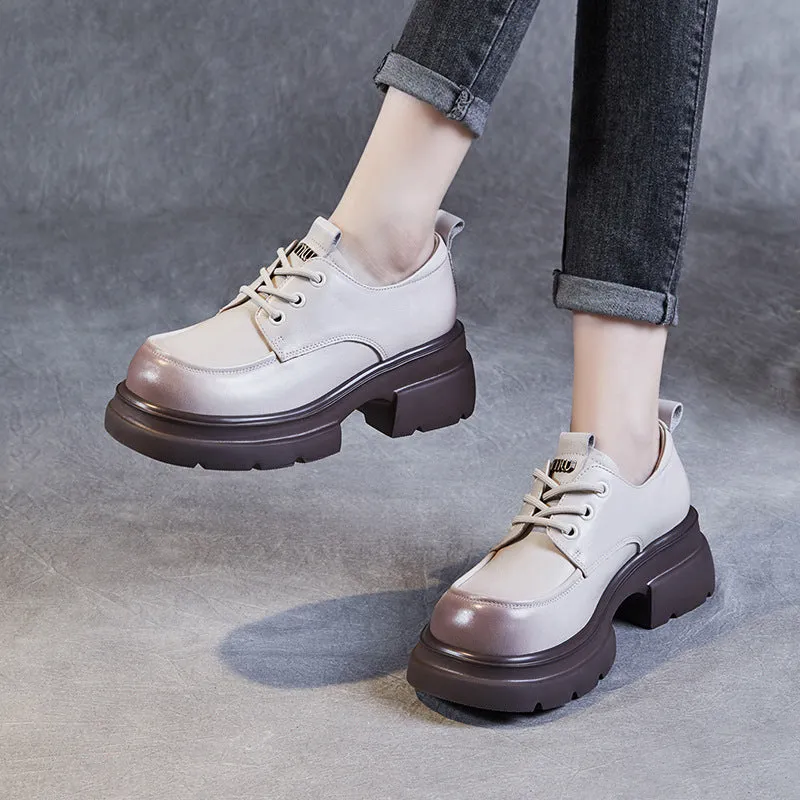 Mocassini con plateau grosso in pelle minimalista da donna