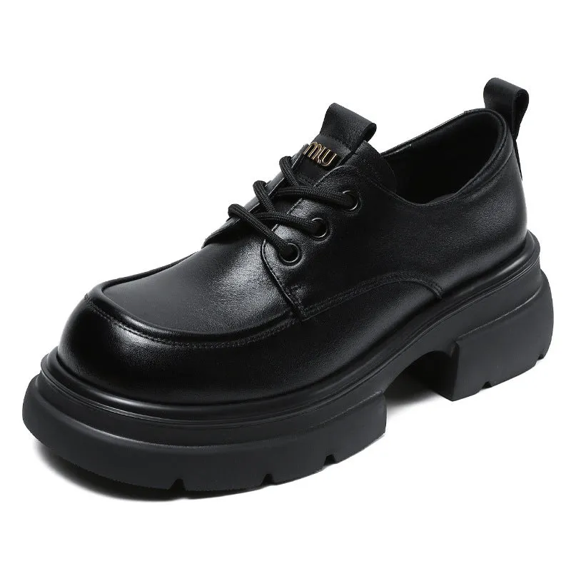 Mocassini con plateau grosso in pelle minimalista da donna